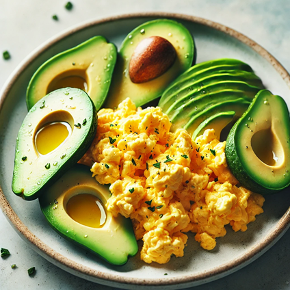 The eggs are fluffy and golden yellow, sitting next to the fresh green avocado